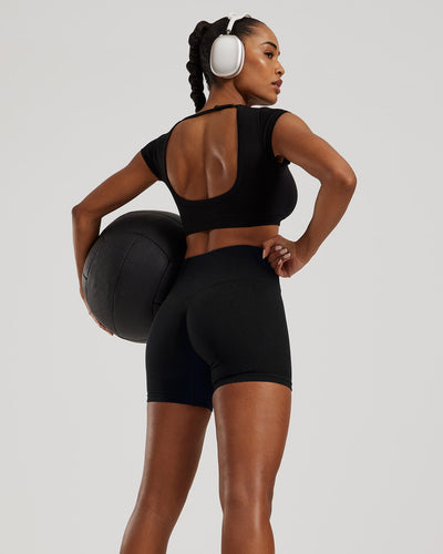 Motion Seamless Open Back Short Sleeve Crop Top | Black